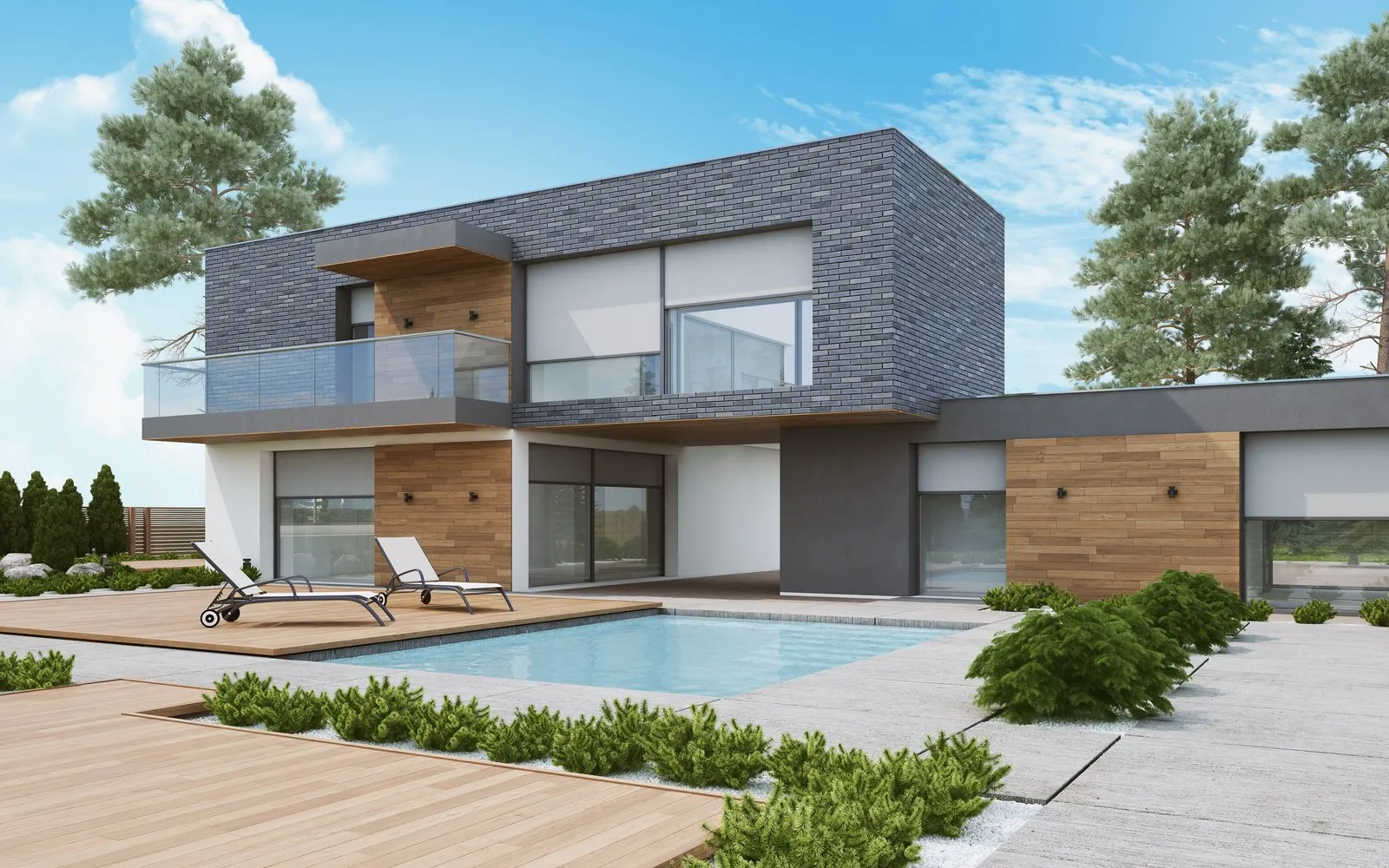 Nowoczesna elewacja domu z dużymi przesuwanymi oknami tarasowymi i balkonową szklaną balustradą