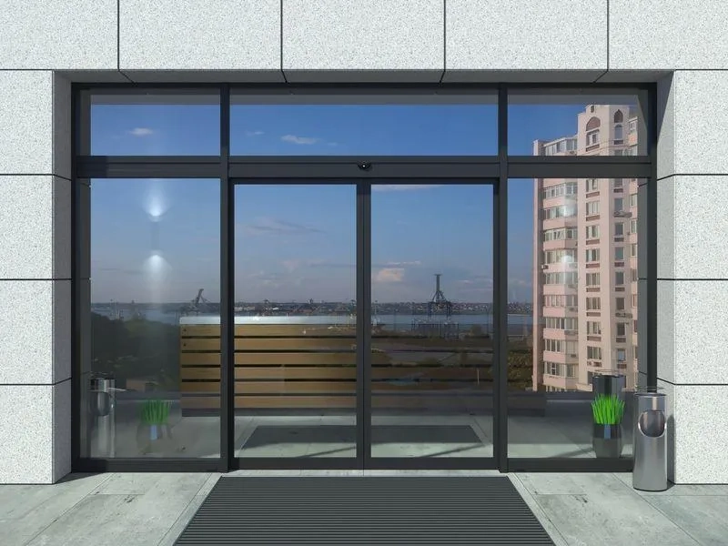 Automatyczne drzwi aluminiowe przesuwne z przeszklonym portalem wejściowym budynku